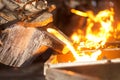 perator pouring molten metal in automatic casting line in foundry factory