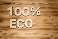 100 percent ECO words made of wooden letters on wooden board. Royalty Free Stock Photo