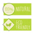 100 percent natural and eco friendly with leaf sign in green ban Royalty Free Stock Photo