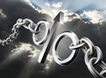 Percent sign in the form of a steel chain. The concept of a torn steel chain in the background of a stormy sky. Increasing
