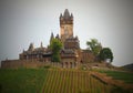 Perched high on the hill over the Moselle River in the picturesque town of Cochem. Surrounded by sloping vineyards the castle