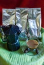 Percolator and coffee with cicada