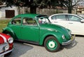 Vintage green Beetle, or Type 1, parked at the road side Royalty Free Stock Photo