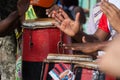 Percussionist hands playing atabaque. Marked rhythm.