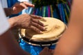 Percussionist hands playing atabaque