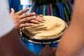 Percussionist hands playing atabaque