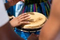 Percussionist hands playing atabaque