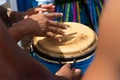 Percussionist hands playing atabaque