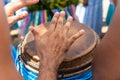 Percussionist hands playing atabaque