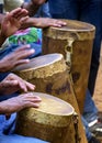 Percussionists group playing a rudimentary atabaque made with leather and wood Royalty Free Stock Photo