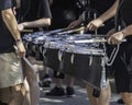 several percussionists of a marching band drum line warming up for a parade Royalty Free Stock Photo