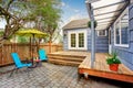 Perfect back deck with concrete patio and chairs. Royalty Free Stock Photo