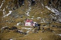 A lonely cottage with a red roof