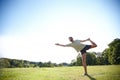 Perfect balance. Full length shot of a handsome mature man doing yoga outdoors. Royalty Free Stock Photo