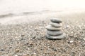 Perfect balance of stack of pebbles on the seashore. Concept of balance, harmony and meditation. Helping or supporting someone for