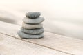 Perfect balance of stack of pebbles on the seashore. Concept of balance, harmony and meditation. Helping or supporting someone for