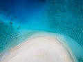 Perfect beach for holidays vacation with white sand and turquoise blue transparent water. Top down aerial view from drone. Royalty Free Stock Photo