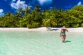 Close up portrait of beautiful young woman enjoying the sun at beach. Summer travel concept design. Summer beach vacation holiday Royalty Free Stock Photo