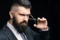 Perfect beard. Haircuts for men. Stylish and hairstyle. Hair salon and barber vintage. Barber shop. Barber on black Royalty Free Stock Photo