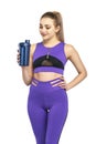 Sporty slim fitness woman. Girl holding sport bottle. Healthy woman body curve with sport wear on white background Royalty Free Stock Photo