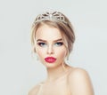 Perfect blonde woman portrait. Beautiful female model with wedding hairstyle and jewelry diadem Royalty Free Stock Photo