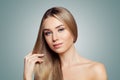 Perfect blonde woman showing her long healthy straight hair portrait. Hair care and hair straightening concept Royalty Free Stock Photo