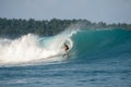 Perfect blue aquamarine wave, empty line up, perfect for surfing, clean water, Indian Ocean,  Mentawai Royalty Free Stock Photo