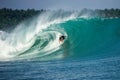 Perfect blue aquamarine wave, empty line up, perfect for surfing, clean water, Indian Ocean,  Mentawai Royalty Free Stock Photo