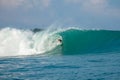 Perfect blue aquamarine wave, empty line up, perfect for surfing, clean water, Indian Ocean,  Mentawai Royalty Free Stock Photo