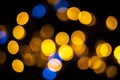 Perfect bokeh for a festive New Year and Christmas background. Defocused yellow and blue light circles