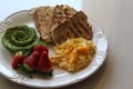 Perfect breakfast with toast, avocado, egg and berries