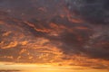 Perfect clouds filled with different colors. From orange and almost yellow to dark blue