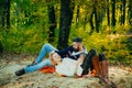 This is perfect cofe. Family picnic. Valentines day. couple in love relax in autumn forest. Camping and hiking. Happy