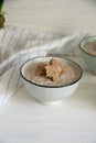 Mushroom cream soup with bread crumbs in two deep bowls Royalty Free Stock Photo