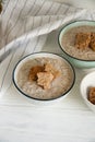 Mushroom cream soup with bread crumbs in two deep bowls Royalty Free Stock Photo