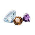 Perfect dazzling faceted gems. Beryl aquamarine, quartz citrine and quartz amethyst. Luxury jewels Royalty Free Stock Photo