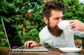Perfect deal. office worker. Successful businessman. brutal bearded hipster at coffee break. happy man working on laptop Royalty Free Stock Photo
