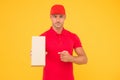Perfect delivery. Delivery man yellow background. Express delivery courier. Parcel post package. Targeted Delivery
