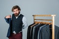 Perfect design. Man in boutique. Man with suit. tailor in his workshop. Handsome bearded fashion man in classical Royalty Free Stock Photo