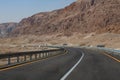 Perfect empty mountain road at a hot summer day