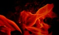 Fire dark red over black background wallpaper. Royalty Free Stock Photo
