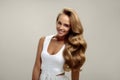 Perfect Hair. Beautiful Woman Model With Long Blonde Curly Hair Royalty Free Stock Photo