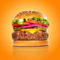 Perfect hamburger classic burger american cheeseburger isolated on colorful orange background