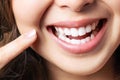 Perfect healthy teeth smile of a young woman. Teeth whitening. Dental clinic patient. Image symbolizes oral care