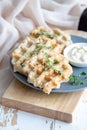 Chicken and cheese waffles with sour cream sauce