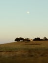 Perfect house on a hill sunset and moon up