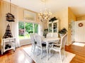 Perfect kitchen with white interior, yellow walls, and hardwood Royalty Free Stock Photo