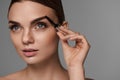 Perfect Makeup For Beautiful Woman. Brow Care For Eyebrows Royalty Free Stock Photo