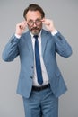Perfect male. looking smart and intelligent. man with beard and glasses feel confident. serious looking businessman in