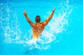 Perfect male Torso on blue water background. Vacation at Paradise. Vacation. Luxury Travel Expert. Young man Swimming Royalty Free Stock Photo